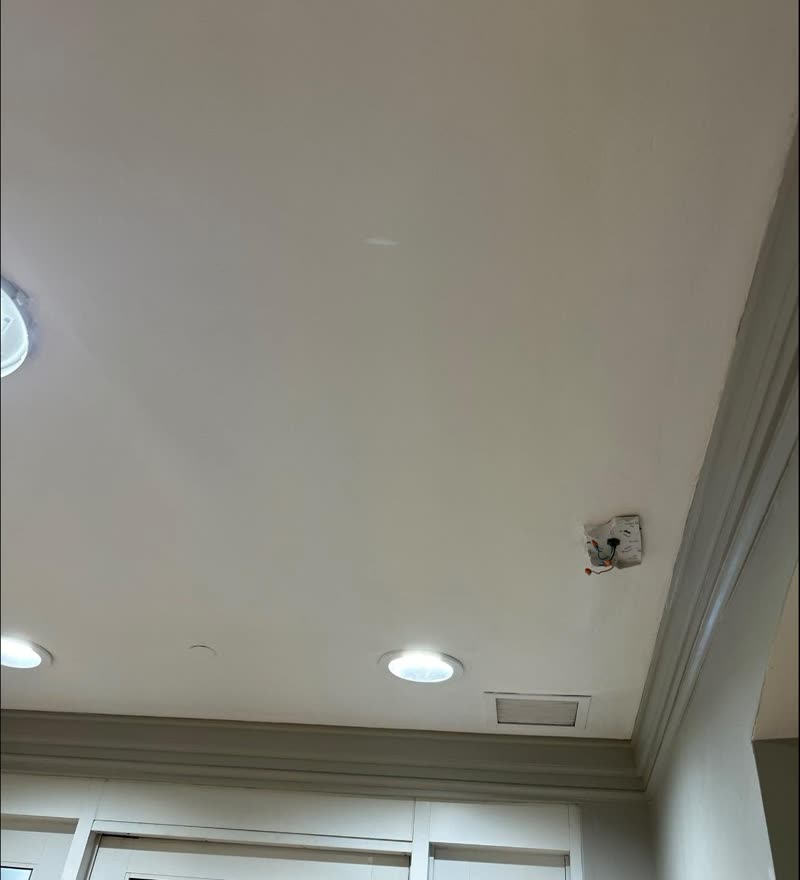 Kitchen ceiling after — smooth white finish with recessed lighting